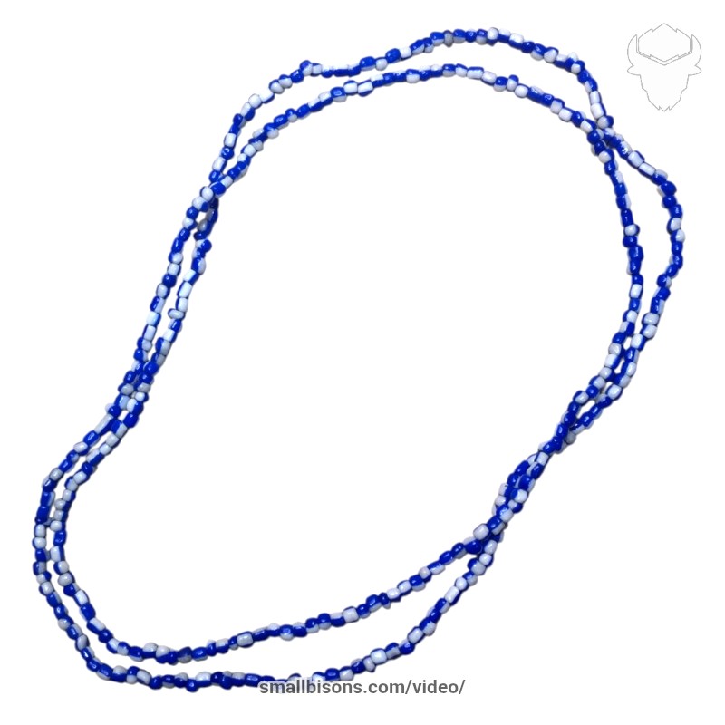 Collar eleke de San Lázaro en cuentas rayadas y abalorios