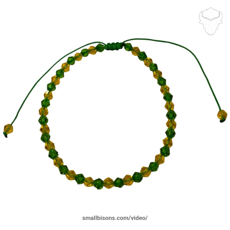 Brazalete en hilo chino con cristales Swarovski en colores Verde y Amarilla